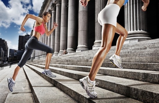 Two girls are running in a race