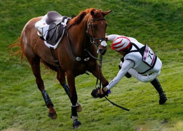Japan's Yoshiaki Oiwa equestrian athletes fell in the field of Greenwich Park