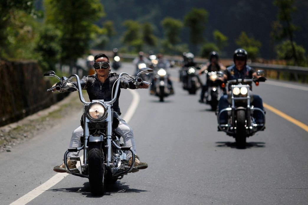Bikers take part in the annual Harley Davidson rally at Lake Qiandaohu in Zhejiang Province, China