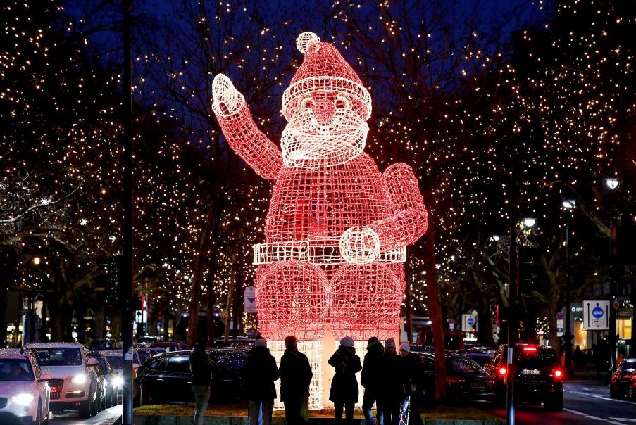 Massive luminous figure of Santa Claus in Berlin, Germany