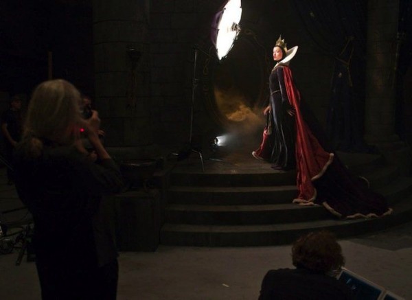 Olivia Wilde as the Evil Queen and Alec Baldwin as a magic mirror