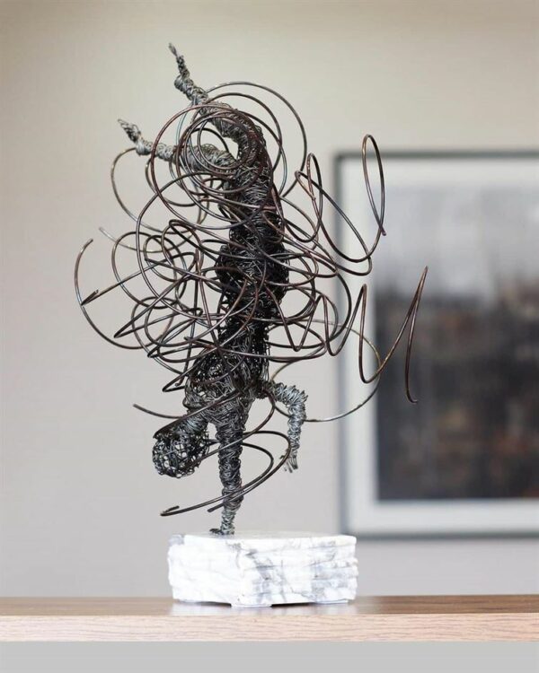 Poetic Wire Sculptures Appear To Be In Movement